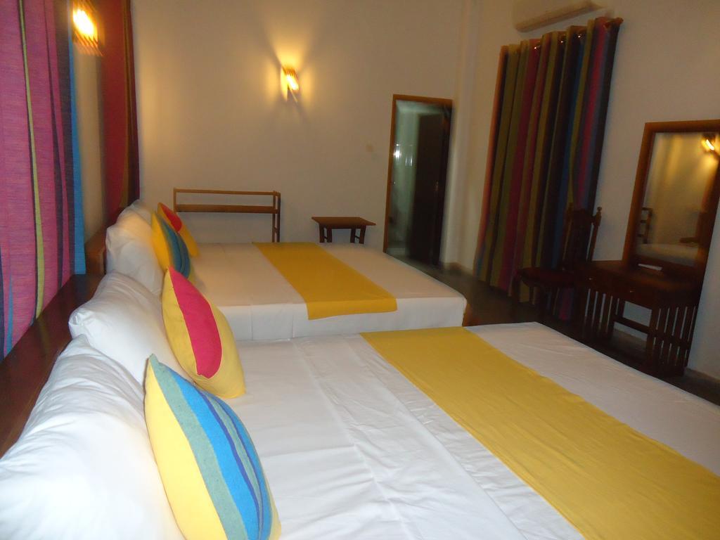 Santori Unawatuna Habitación foto